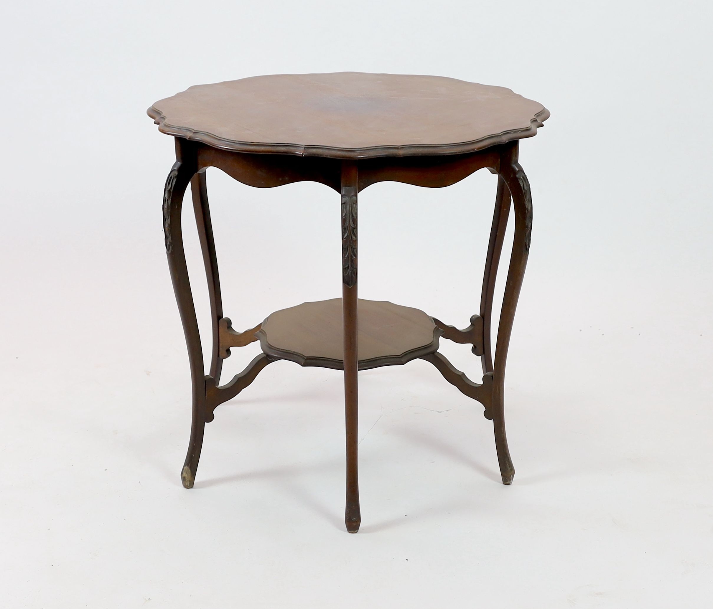 A late Victorian mahogany centre table, with shaped circular top, diameter 74cm height 69cm